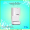 Automatic hand dryers with a water tray