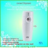 Automatic home appliance aroma dispenser