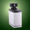 Compacted design water softener