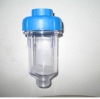 Washer water filtration housing
