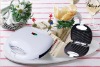 portable sandwich toaster with white surface